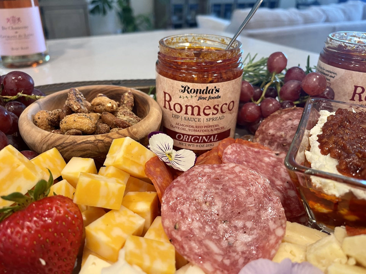 Ronda's Fine Foods Romesco spread on meat close-up with bold, nutty notes