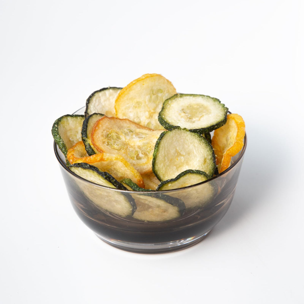 Root Foods zucchini chips sea salt finish enhances natural color.