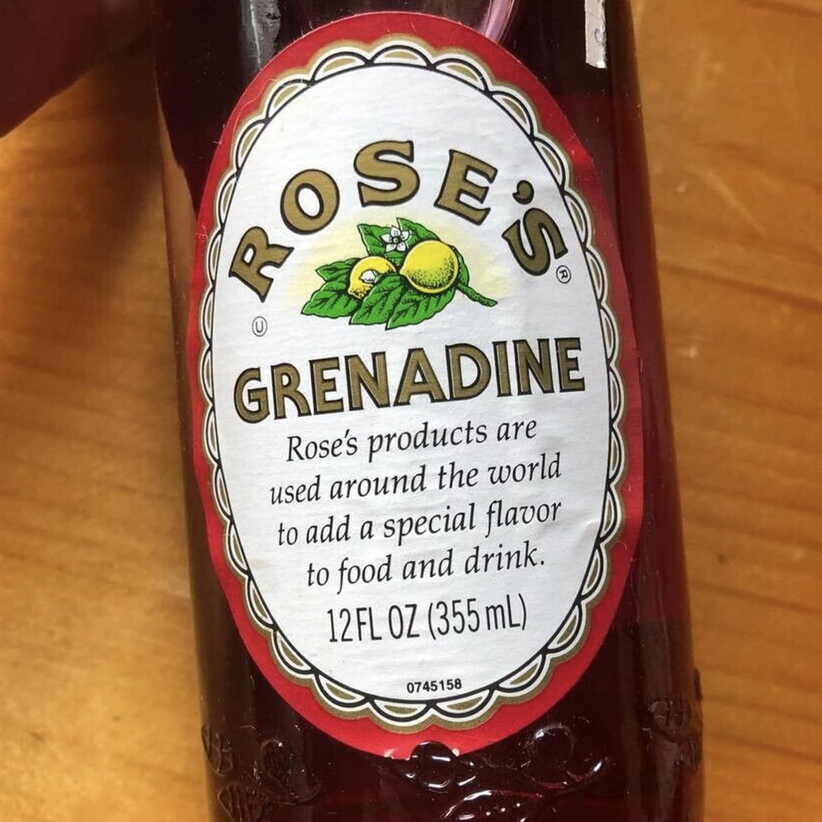 Rose’s Grenadine syrup close-up emphasizes pomegranate flavor and smooth blend.