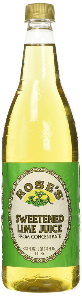 Rose's Lime Juice bottle being poured into a glass, ideal for cocktails and mixers.