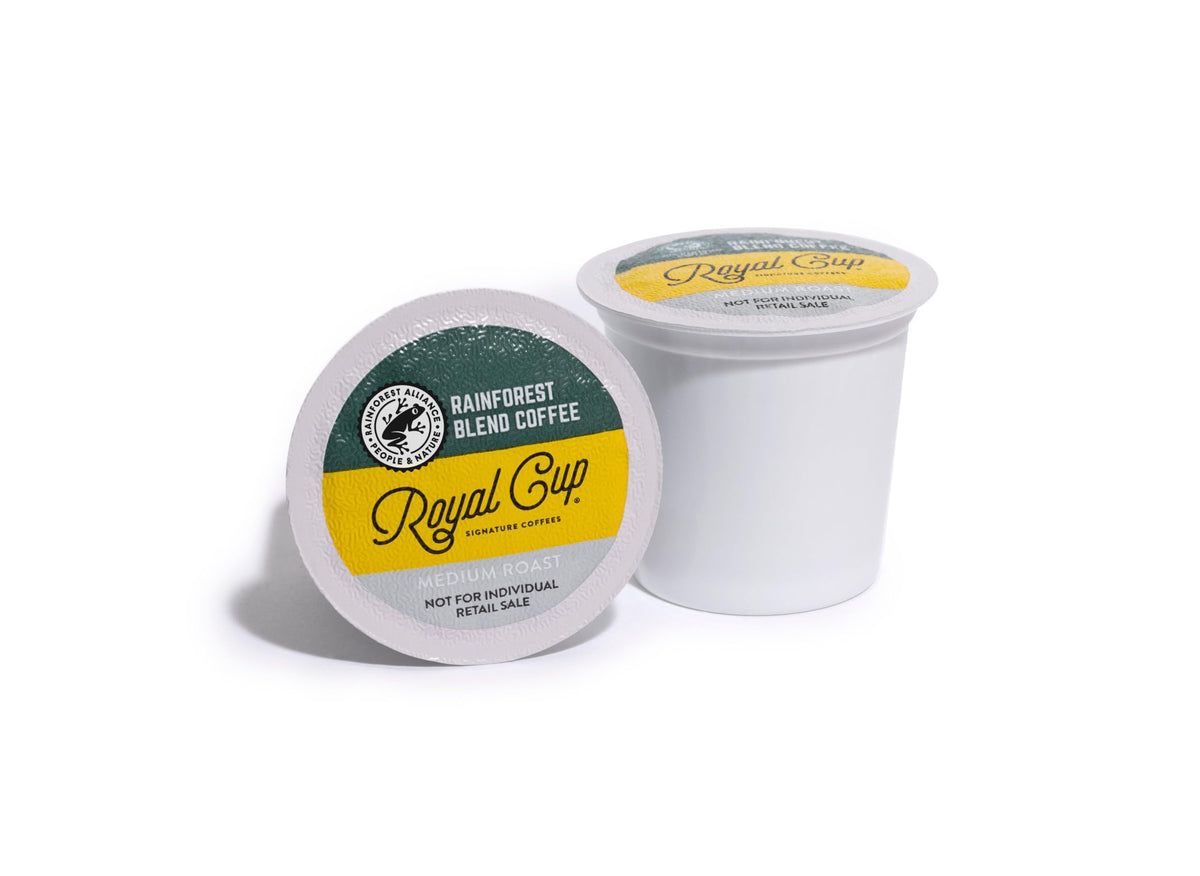 ROYAL CUP SIGNATURE Rainforest Blend capsules delivering rich flavor in every cup.