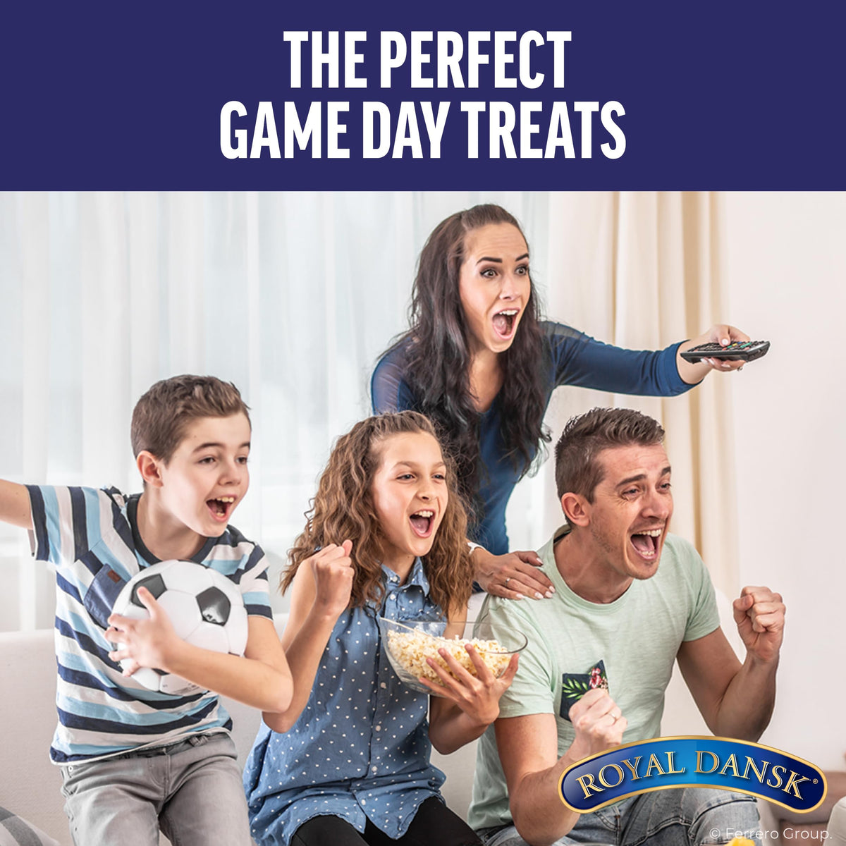 Opened Royal Dansk tin framed with cookies, ready for gifting or host-friendly moments.