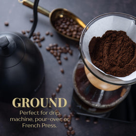 Royal Kona Coffee Ground brew pour with crema hints for a balanced cup.