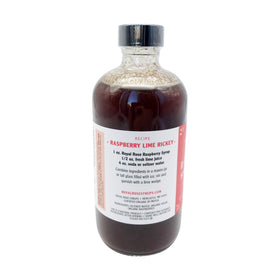 Royal Rose Raspberry Syrup drizzled over pancakes for a fruity breakfast.