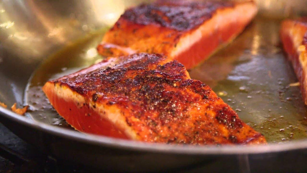 Rub with Love Salmon Rub ingredients showcase paprika thyme and brown sugar for natural seasoning.