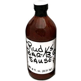 Rudy's BarBQ Sauce bottle for smoky glaze on ribs