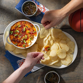 Ruffles ridged texture close-up, showcasing sturdy crunch for dips.
