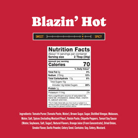 Rufus Teague Blazin' Hot BBQ sauce glaze on ribs during cook