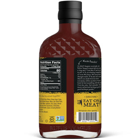 Rufus Teague Honey Sweet BBQ Sauce being poured for a smooth, sticky glaze