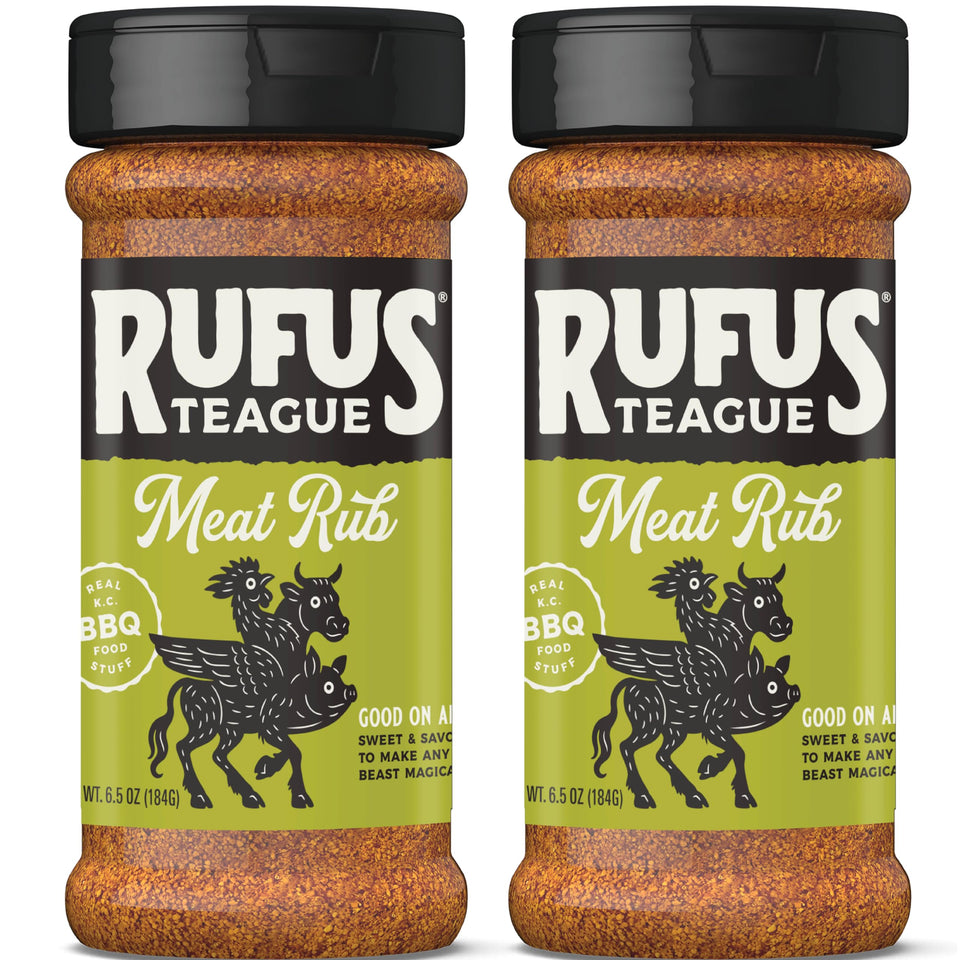 Rufus Teague Meat Rub bottle displaying premium seasoning for grilling.