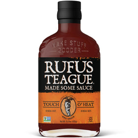 Rufus Teague Touch O' Heat BBQ Sauce bottle shows bold grilling flavor.