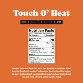 Rufus Teague Touch O' Heat ribs-glaze closeup captures caramelized, blue-ribbon finish