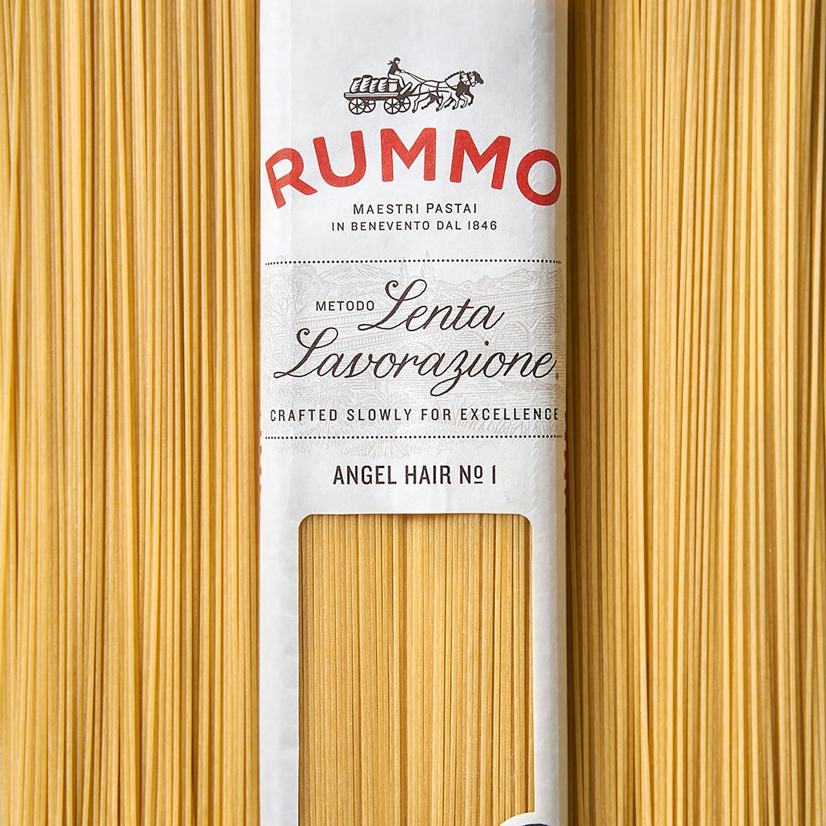 Dish-perfect Rummo pasta plated with light sauce and herbs.