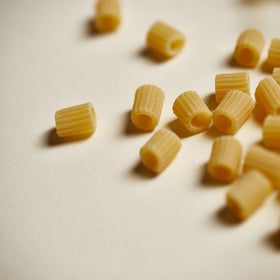 Rummo durum-wheat-semolina pasta uncooked, showcasing high-quality ingredients.
