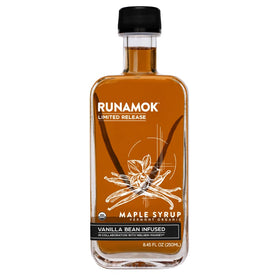 Runamok Maple Vanilla Bean Infused Maple Syrup bottle on kitchen shelf, premium Vermont flavor.