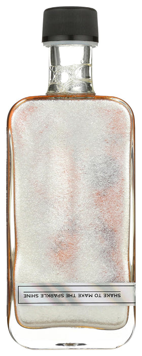 Runamok Sparkle Syrup in a glass as a glossy beverage topper