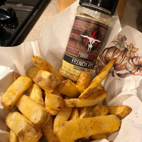 Fries with Runnin’ Wild Seasoning show sizzling, evenly coated finish
