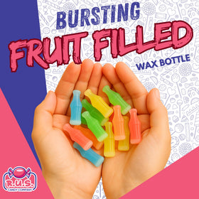R.U.S. Candy orange wax bottle, bright citrus flavor.