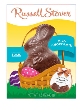 Three Russell Stover bunnies arranged for an Easter table display.