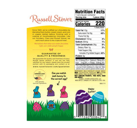 Gifting-ready Russell Stover milk chocolate bunny on a table for Easter.