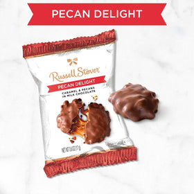 Russell Stover Milk Chocolate Pecan Delight pecan center, premium snack.