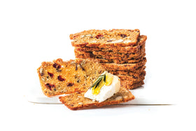 Cheese platter-ready Rustic Bakery Tart Cherry Crisps enhancing a tasting