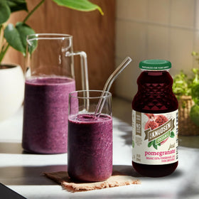 R.W. Knudsen juice poured in a glass shows ruby color.