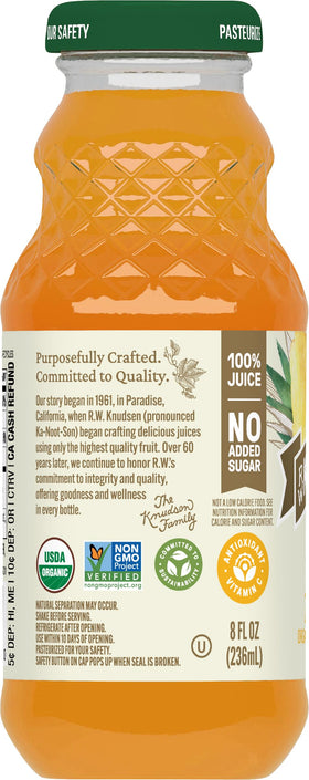 Glass of R.W. Knudsen Pineapple Juice showing vibrant color
