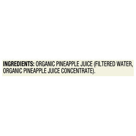 Pouring R.W. Knudsen Organic Just Pineapple Juice into a glass