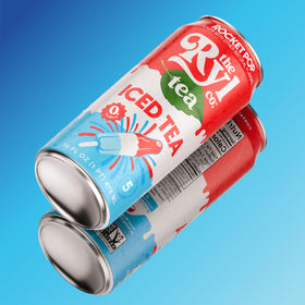 The Ryl Co Rocket Pop glass with can illustrates a refreshing summer moment.