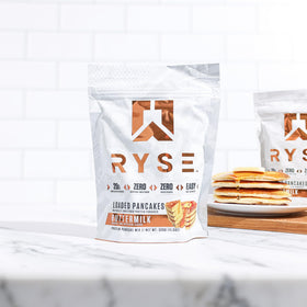 RYSE Loaded Protein Pancake Blueberry scoop shows precise macros for planning.