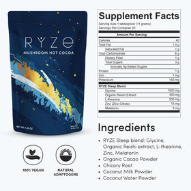 RYZE Superfoods Mushroom Hot Cocoa spoon with powder beside a mug.