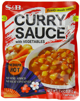 S&B Curry Sauce with Vegetables Medium Hot bottle pour for quick weeknight meals.