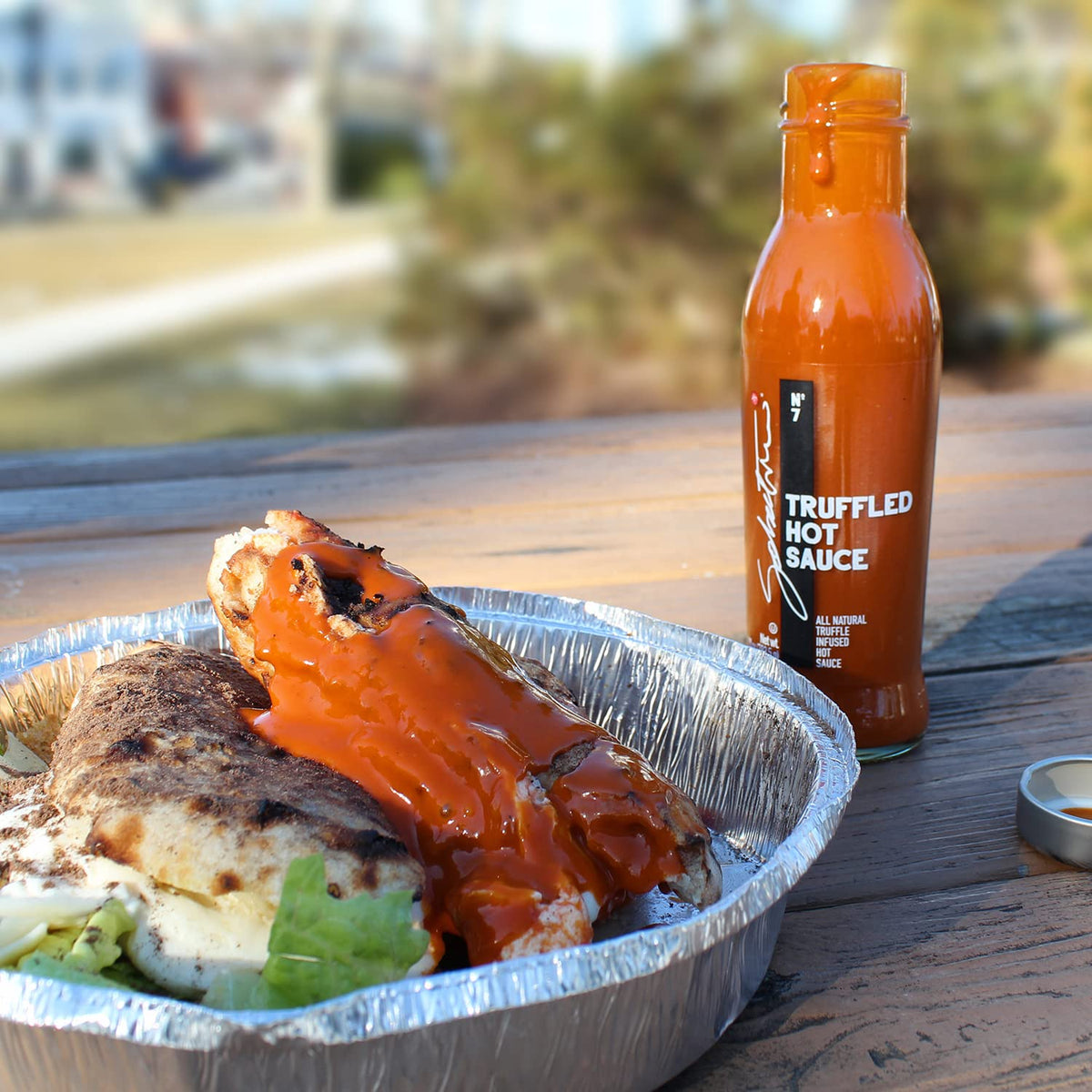 Sabatino Tartufi truffle hot sauce drizzle over pizza boosts depth