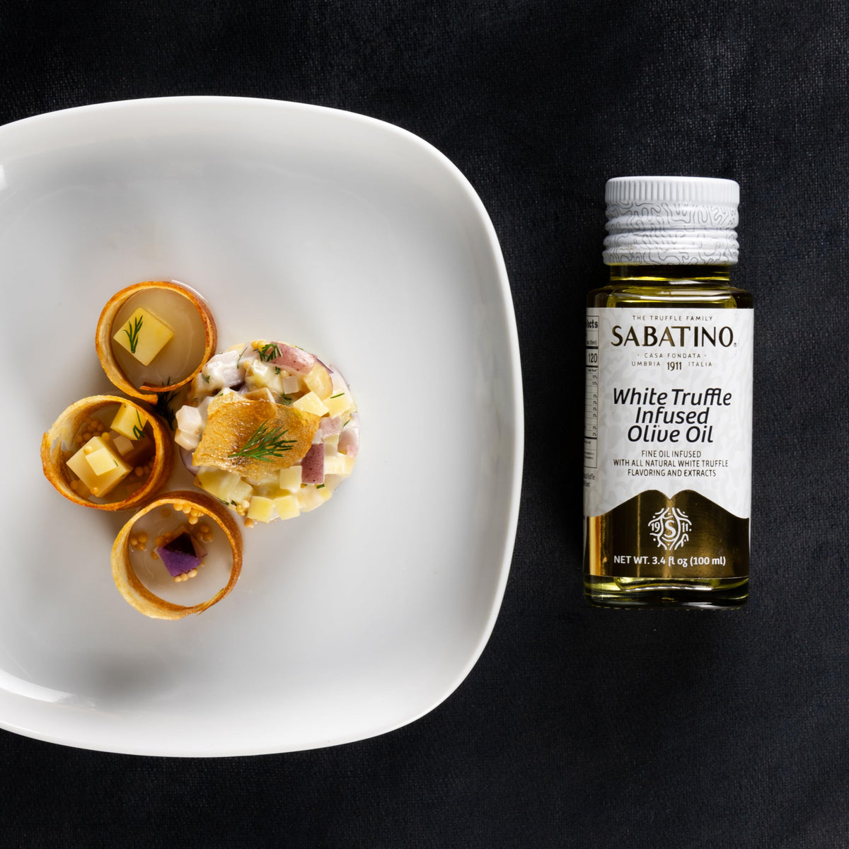 Sabatino Tartufi kosher-certified olive oil label visible for dietary compliance