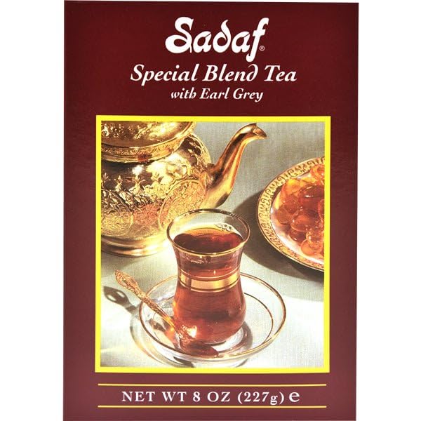 Sadaf Earl Grey tea being poured to reveal smooth, full-bodied aroma.