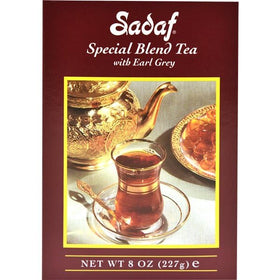 Sadaf Earl Grey tea being poured to reveal smooth, full-bodied aroma.