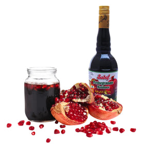 Sadaf Pomegranate Sour Paste Molasses bottle closeup shows glossy texture ideal for glazes.