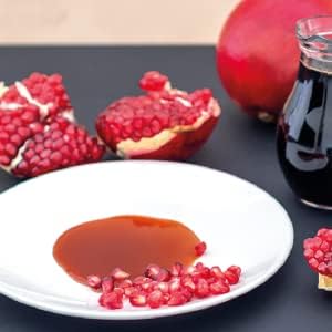 Sadaf Pomegranate Sour Paste Molasses dish drizzle enhances salads and stews.