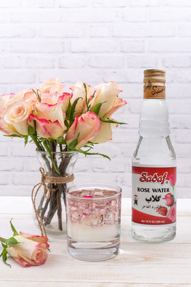 Sadaf Rose Water bottle being poured for drinks