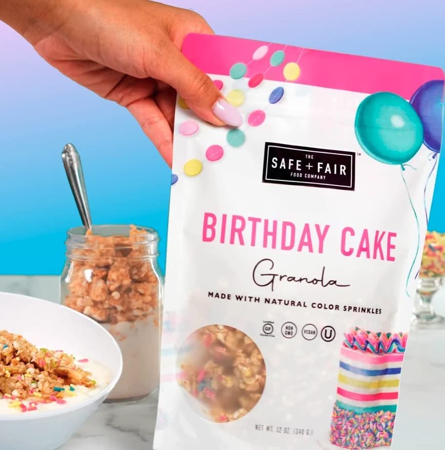 Safe + Fair Birthday Cake Granola with yogurt topping and berries.