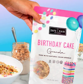 Safe + Fair Birthday Cake Granola with yogurt topping and berries.