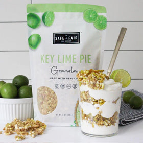 Granola poured into a bowl showing tangy key lime crunch with Safe + Fair.