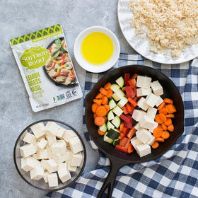 Saffron Road simmer sauce ready meal bowl showcasing convenient weeknight dinner.