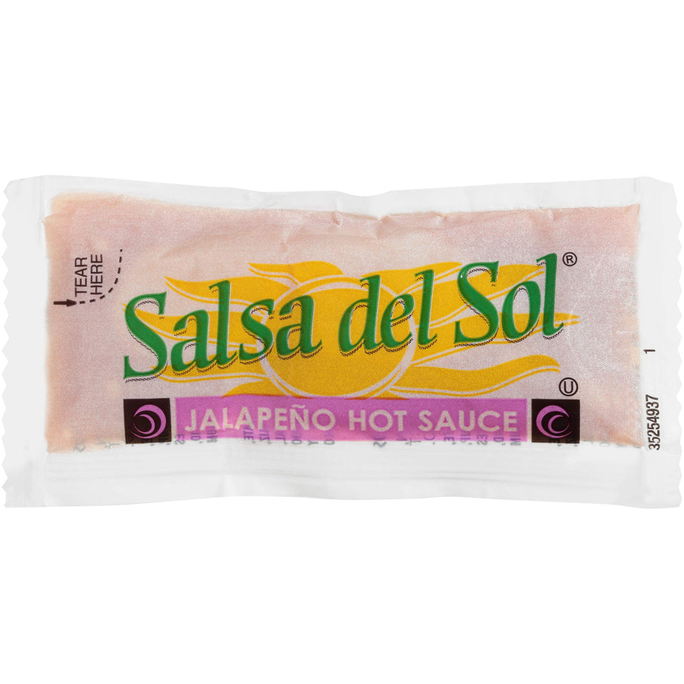 Salsa Del Sol jalapeño hot sauce single-serve packet for on-the-go flavor.