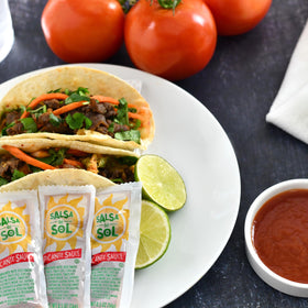Salsa Del Sol Picante sauce packets close-up, showcasing vibrant color for quick flavor