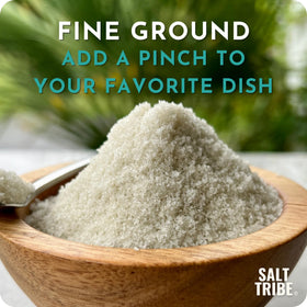 Salt Tribe French Grey Sea Salt grain closeup reveals mineral richness and moisture.