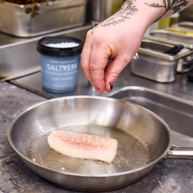 Saltverk flakes add professional finishing touch when seasoning chef-prepared meals.