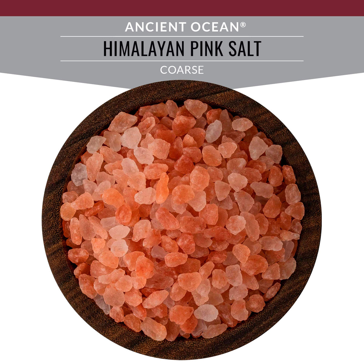 SaltWorks Ancient Ocean pink salt in a stylish jar on a shelf.