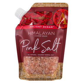 SaltWorks Ancient Ocean pink salt with pour spout for easy seasoning.